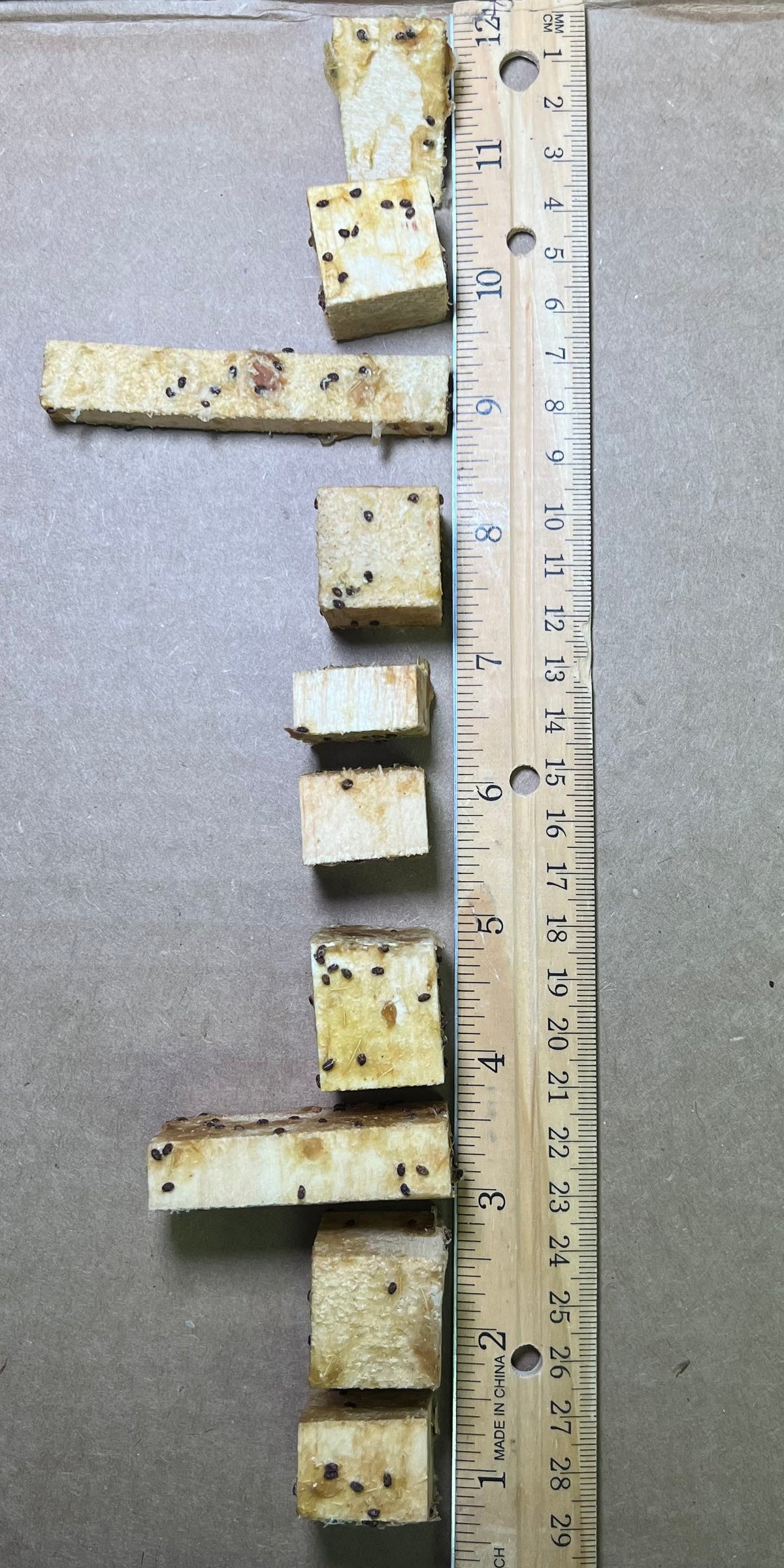 Variety of balsa wood shapes flavored with kiwi