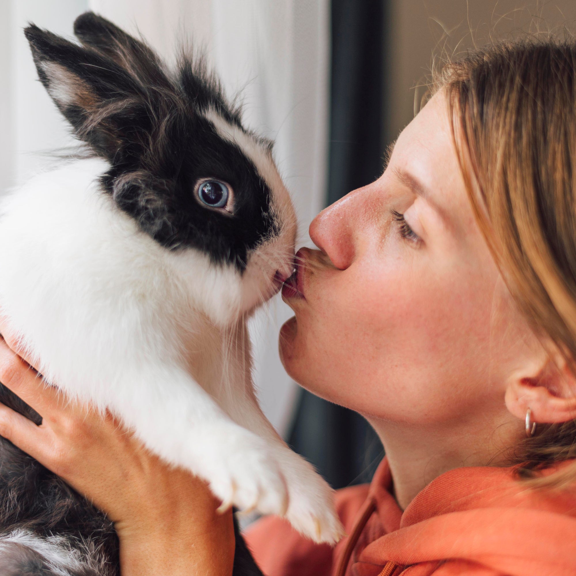 Woman with pet rabbit
